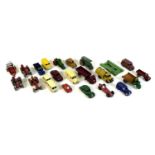 A collection of playworn vintage Dinky model vehicles, including burgundy Rover 75, green Riley, red