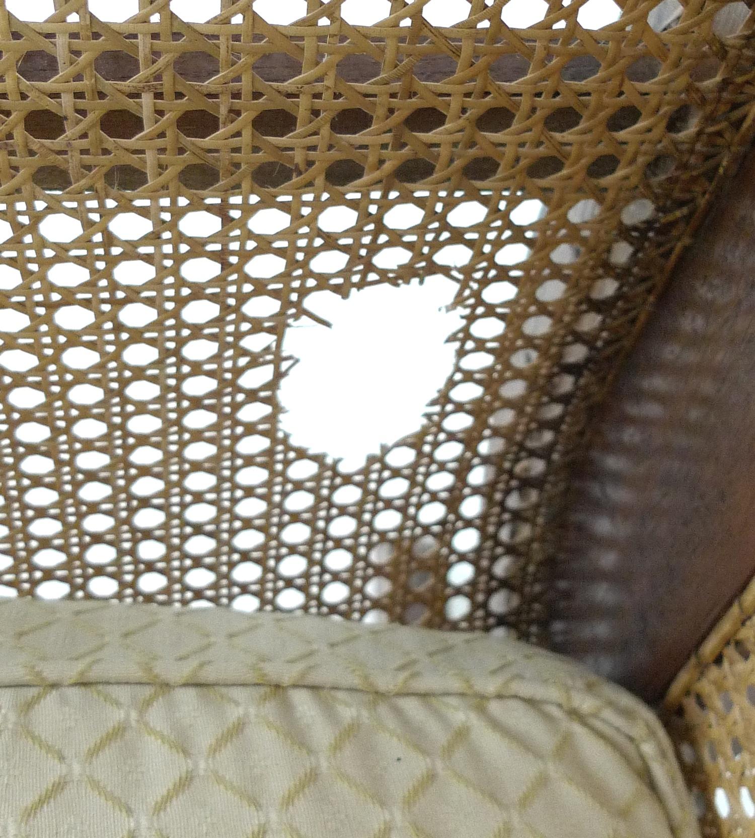 A modern tropical wood bergere settee, with carved frame and scroll arms, caned seat, sides and - Image 3 of 4