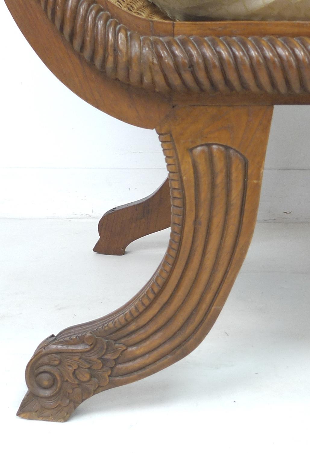 A modern tropical wood bergere settee, with carved frame and scroll arms, caned seat, sides and - Image 2 of 4