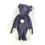 A 1998 Steiff replica 1909 dark blue teddy bear, 35cm high with growler, a certificate numbered