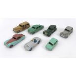 A collection of seven Dinky Toys, most for restoration, comprising a Jaguar XK120 Coupe (157), a
