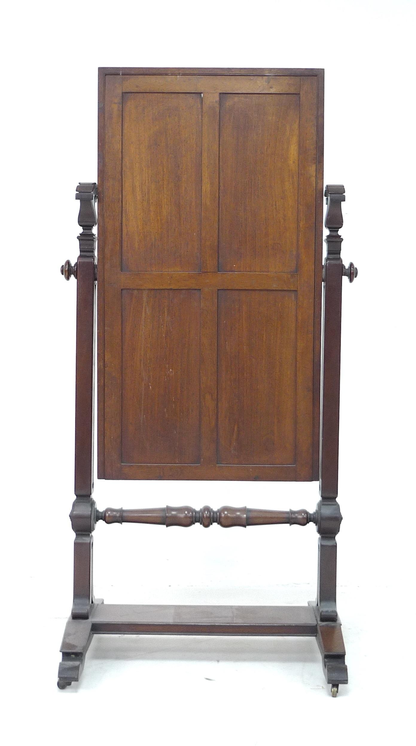 A William IV mahogany cheval mirror, rectangular plate, foliate carved supports, on a rectangular - Image 3 of 3