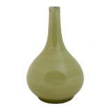 A Chinese porcelain bottle vase, Qing Dynasty, late 19th / early 20th century, with pale green glaze
