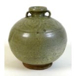 A Chinese pottery celadon glaze two handled jar, probably Ming Dynasty, incised leaf form decoration