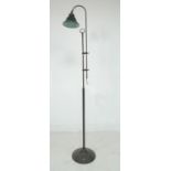 An Edwardian style standard lamp, late 20th century, with part reeded column, adjustable height