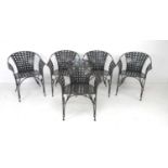 A set of five modern wrought metal and lattice conservatory armchairs, dark lacquered finish with