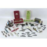 A group of collectable toys, over twenty die cast vehicles figures, including a set of Subbuteo