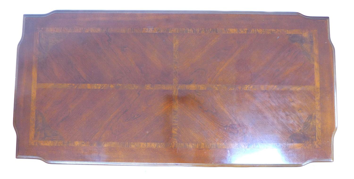 A modern walnut veneered coffee table, with crossbanded decoration, carved frieze and cabriole legs, - Image 2 of 2