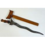 A South East Asian kris dagger, with decorative carved wooden handle and scabbard, blade 37cm,
