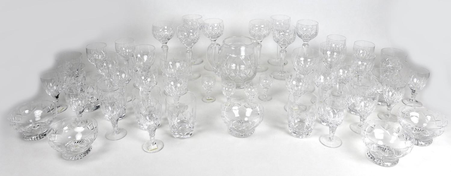 A suite of Stuart crystal drinking glasses, comprising eight large wine, twelve small wine, eight