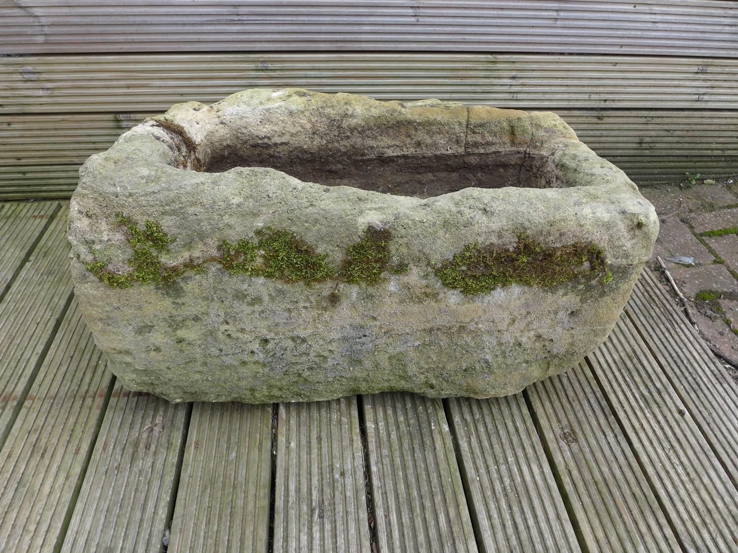 A limestone trough planter, of rustic rectangular form with carved basin, 73 by 47 by 39cm high. - Image 5 of 5