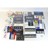 A collection of GB Royal Mail mint unmounted stamps, QEII, in various presentation packs and sets of