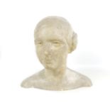 A mid 20th century plaster cast bust of a lady with hair tied into double buns, unsigned, 36 by 24