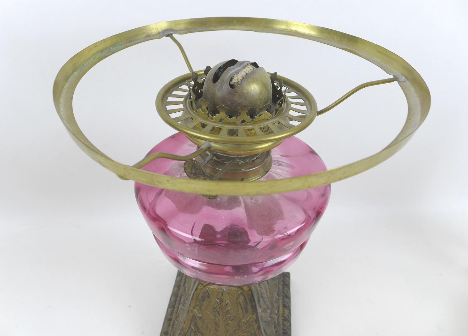 A Victorian paraffin lamp, with cranberry glass reservoir, etched clear glass shade and chimney, - Image 4 of 12