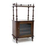 A Victorian rosewood music cabinet, with stainwood and ebony inlaid decoration to upper tiers,