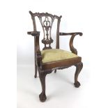 A diminutive reproduction mahogany Chippendale style open armchair, late 20th century, with ornately