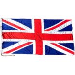 A large Union Jack flag, circa 1970, rope and toggle fixing, 365 by 190cm.