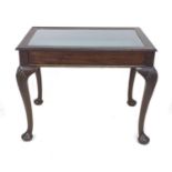 An Edwardian bijouterie table, of rectangular form, glazed lift lid, raised on four cabriole legs