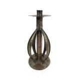 An Arts & Crafts, Arthur John Seward copper candlestick, with planished decoration throughout,