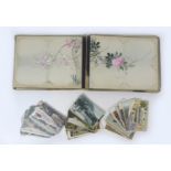 An early 20th century Chinese album with hand painted silk lined pages, a/f, with single lacquered