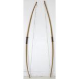 Two long bows, each approximately 177cm. (2)