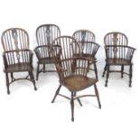 A group of five Windsor armchairs, comprising a late 18th century elm and oak Windsor stamped 'W. P.