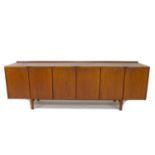 A British teak sideboard, Robert Heritage for Archie Shine, of long low form with small shaped