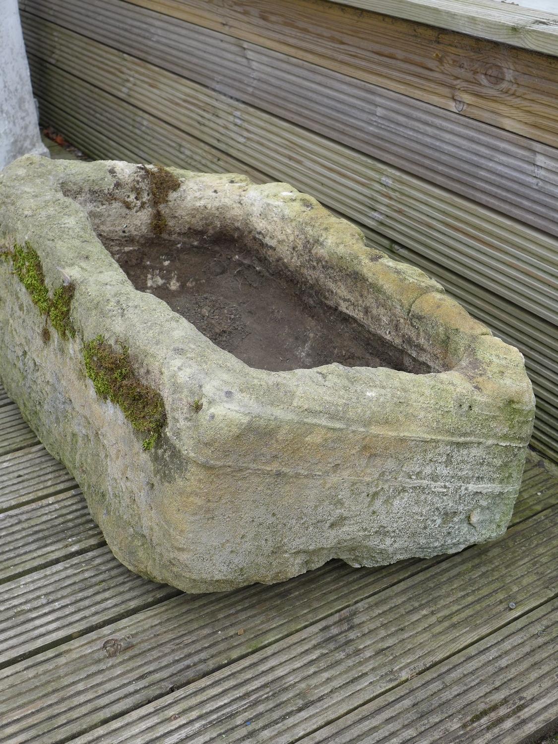 A limestone trough planter, of rustic rectangular form with carved basin, 73 by 47 by 39cm high. - Image 4 of 5