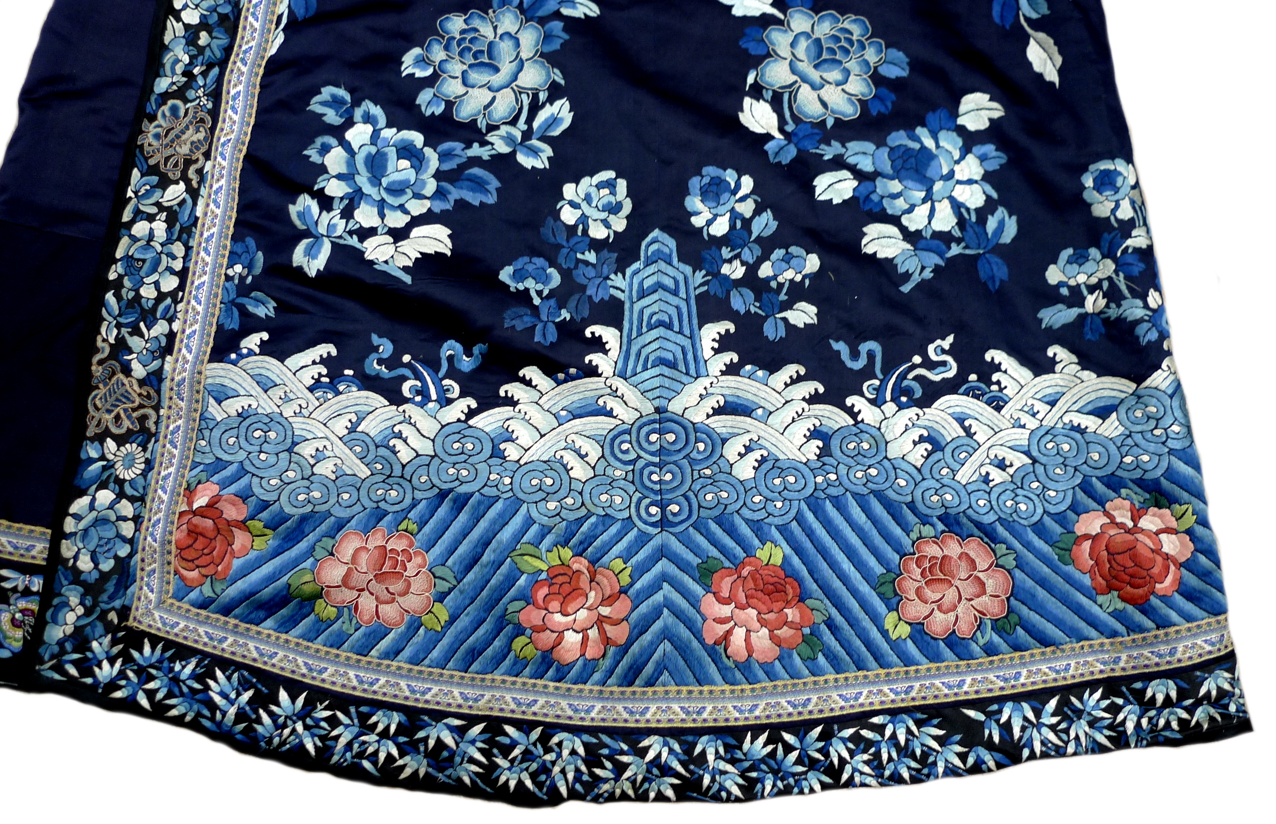 An early 20th century silk Chinese robe, with navy blue ground and intricately embroidered with - Image 4 of 34