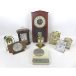 A group of seven modern mantel clocks, together with a set of Ohaus scales, and a Scientec Inc