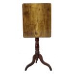 A Victorian mahogany tilt top table, with rectangular top, turned column with tripod base, 51 by