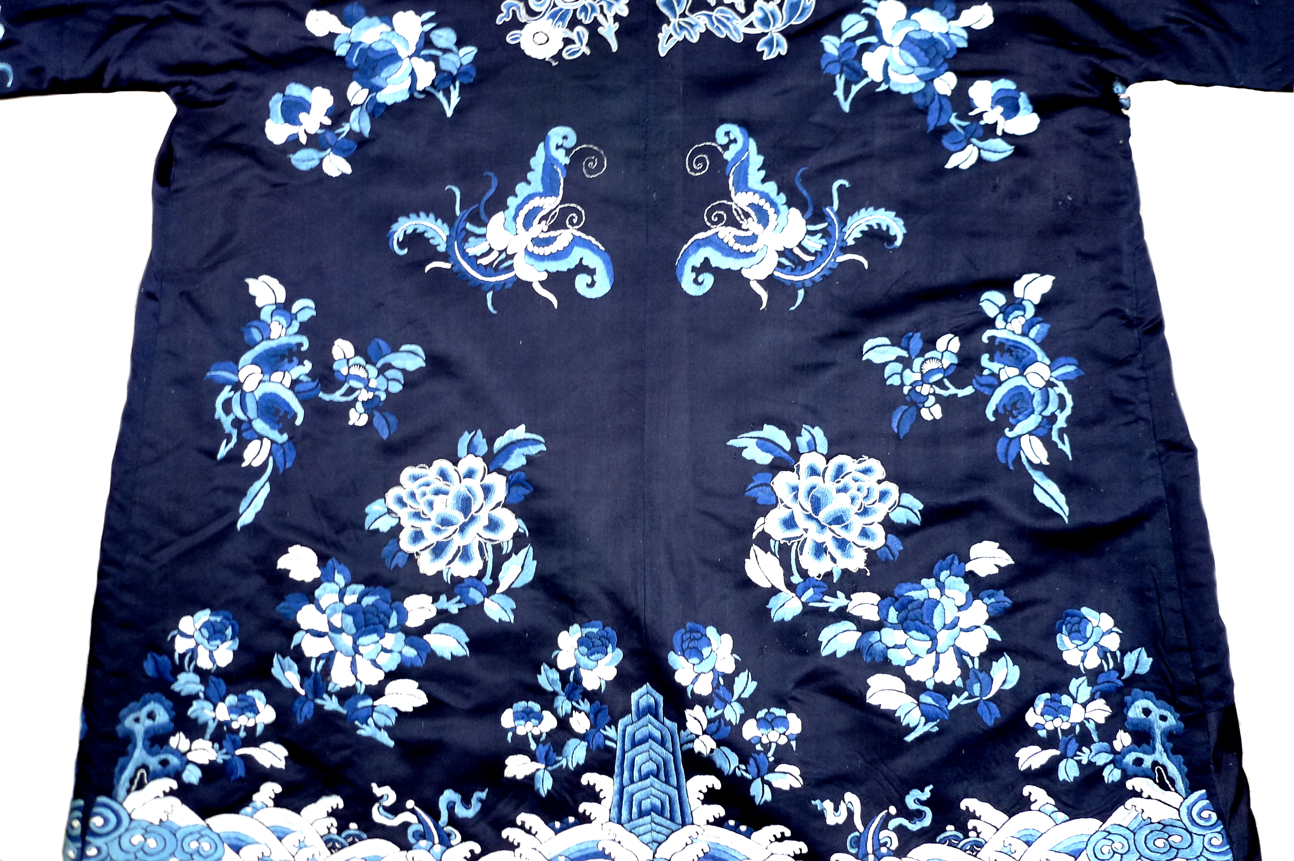 An early 20th century silk Chinese robe, with navy blue ground and intricately embroidered with - Image 26 of 34