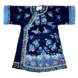 An early 20th century silk Chinese robe, with navy blue ground and intricately embroidered with