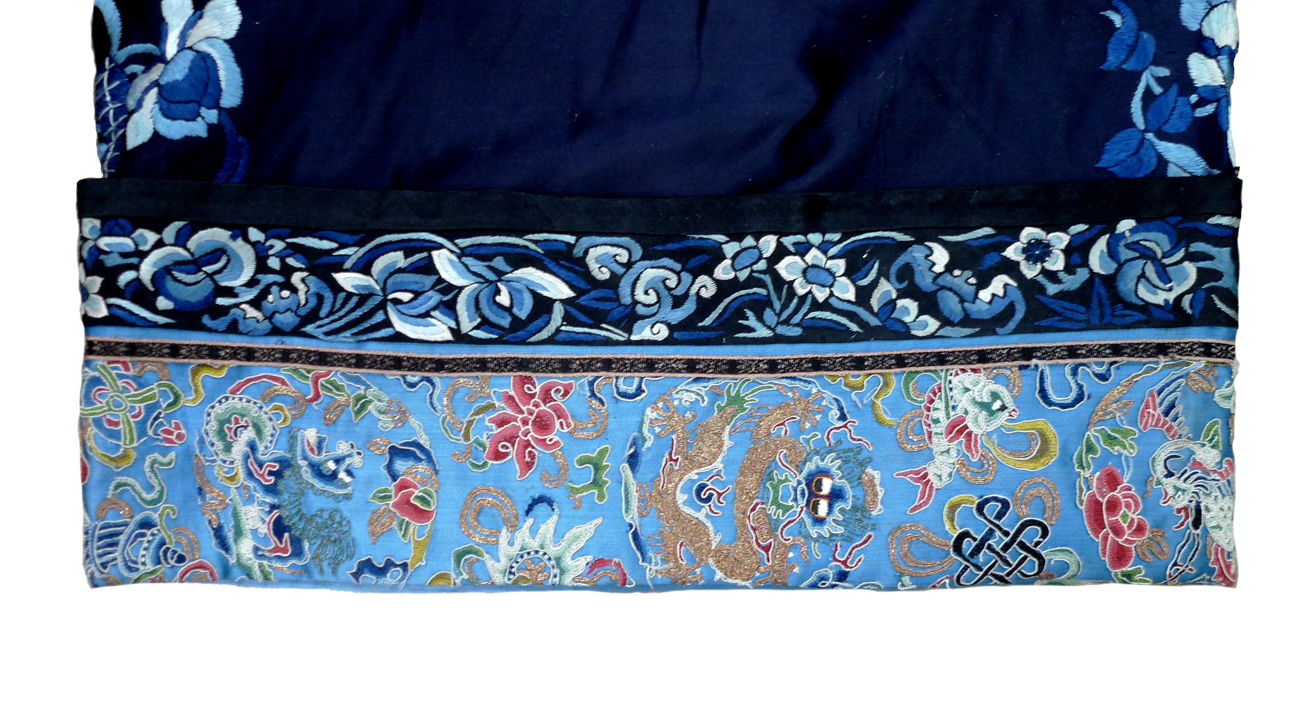 An early 20th century silk Chinese robe, with navy blue ground and intricately embroidered with - Image 33 of 34