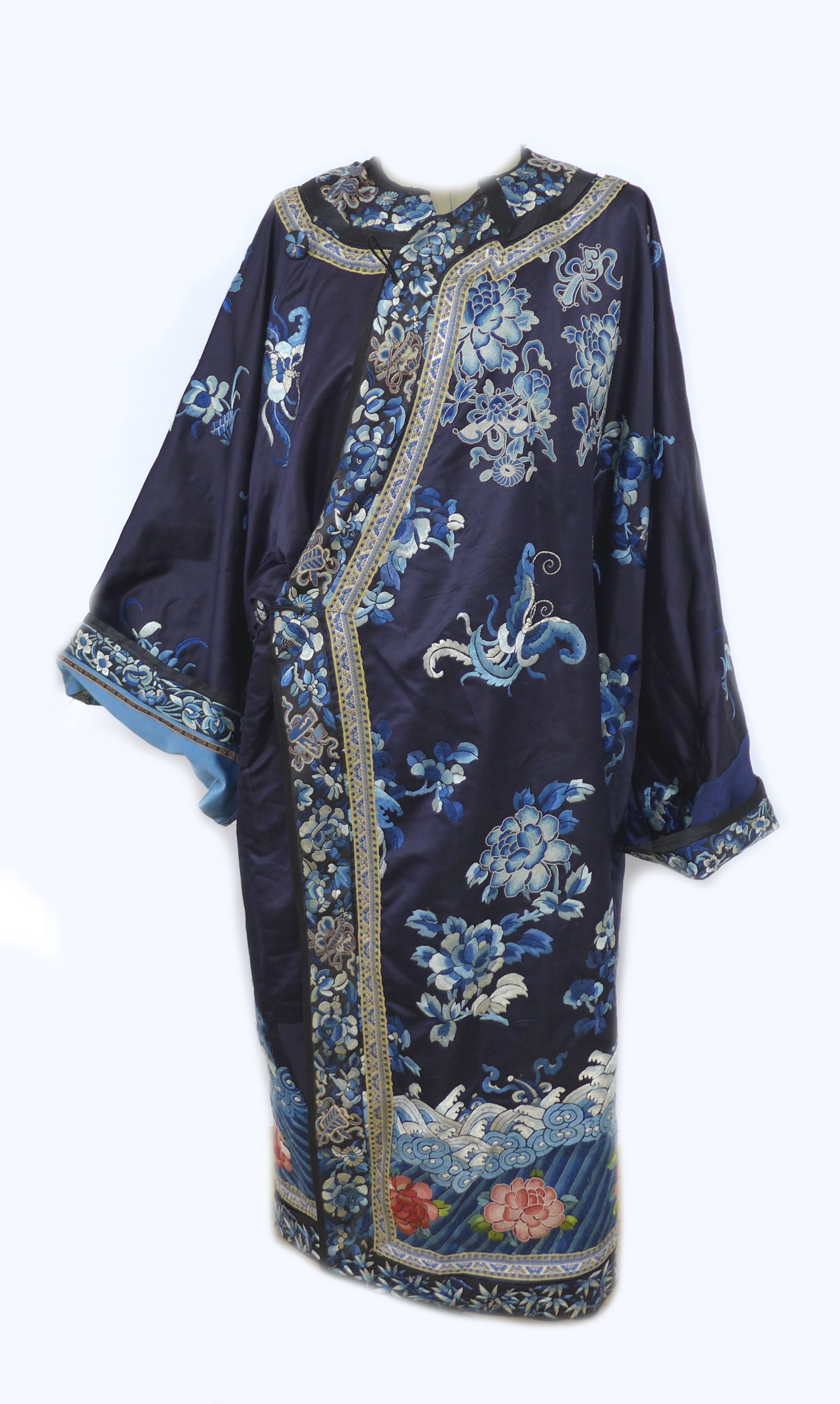 An early 20th century silk Chinese robe, with navy blue ground and intricately embroidered with - Image 3 of 34