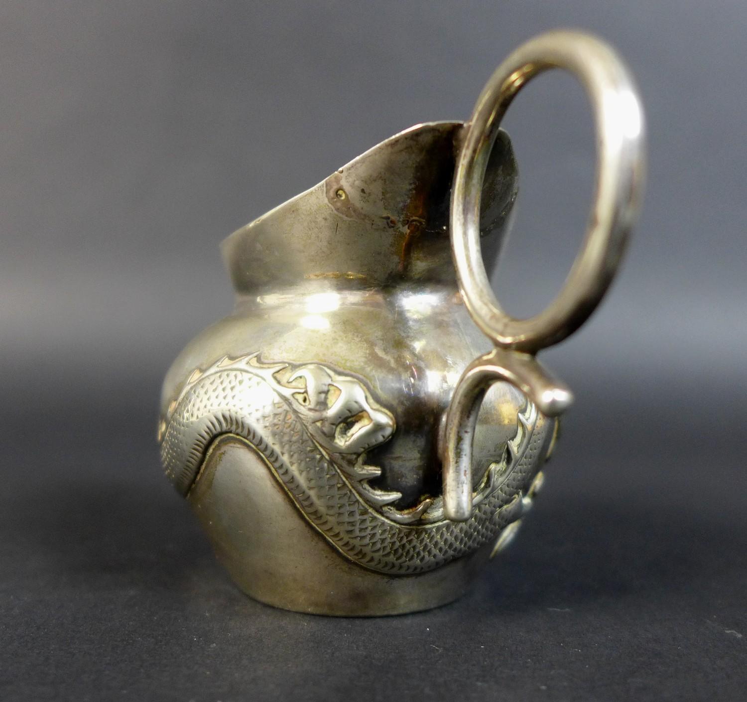 A Wang Hing and Co Chinese export silver jug, decorated with a sinuous dragon chasing his tail - Image 4 of 9