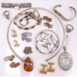 A small group of silver jewellery, comprising a Victorian locket pendant, 5cm, a gate link