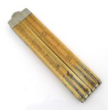 A 19th century marine engineer's folding pocket ruler, in ivory made for Penn & Co London Bridge,