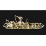 An Elizabeth II silver miniature tea and coffee service, comprising a teapot with lid, 5.3 by 2.2 by