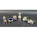A group of silver table wares, comprising a mustard, salt and pepperette, complete with mustard