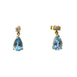 A pair of 18ct gold diamond and aquamarine drop earrings, each with a single 0.05ct brilliant cut