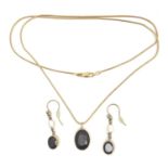 A 9ct gold and garnet demi-parure, comprising a garnet pendant on snake chain, and a pair of