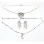 An 18ct white gold, diamond and pearl teardrop necklace, 6.2g together with a pair of 9ct with gold,