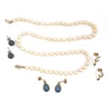 A small group of gold jewellery, comprising a string of 66 cultured pearls, each approximately