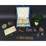 A group of silver and collectables, including a cased set of six spoons and matching tongs with