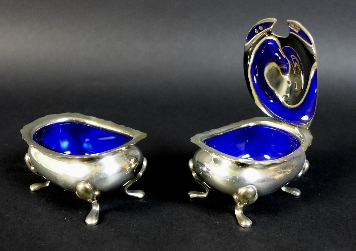 A pair of Edwardian silver sauce boats, the handles with cast jaguar heads, and scroll rim, raised - Image 11 of 15