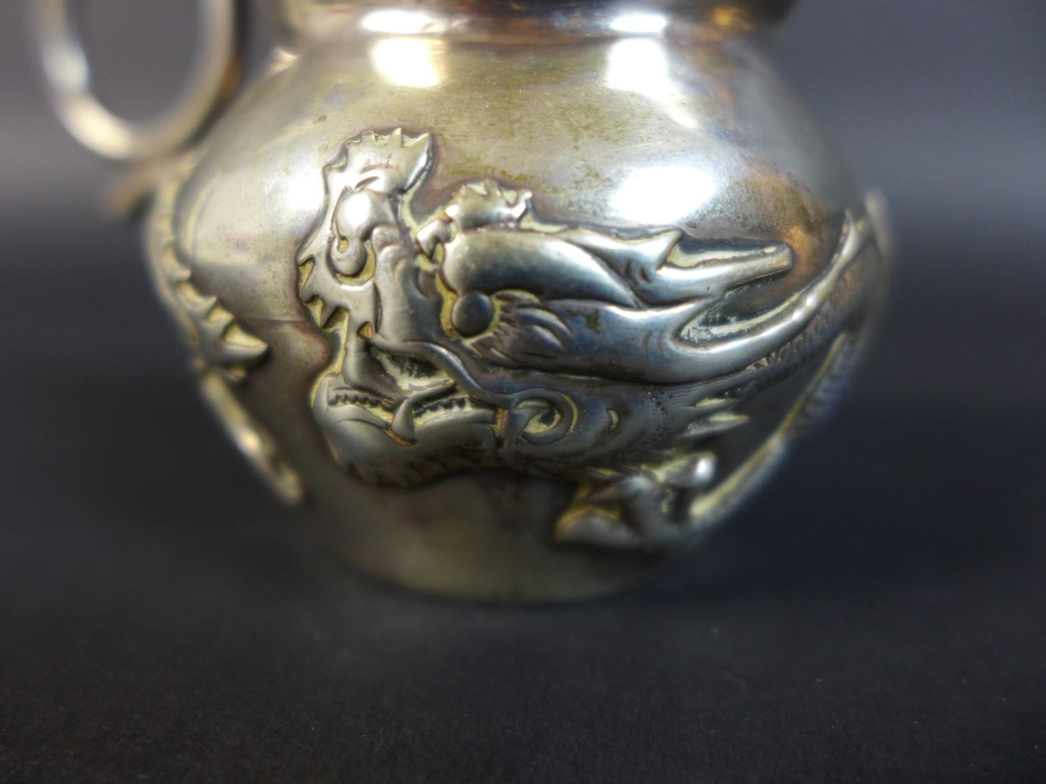 A Wang Hing and Co Chinese export silver jug, decorated with a sinuous dragon chasing his tail - Image 5 of 9