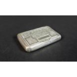 An early 19th century French 950 grade silver snuff box, with bright cut decoration to its lid