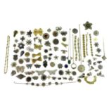 A collection of silver and white and yellow metal filigree jewellery, including a Russian silver