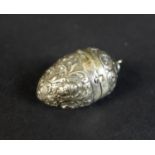 A late Victorian 930 grade imported silver egg shaped hinged box, the body embossed with classical